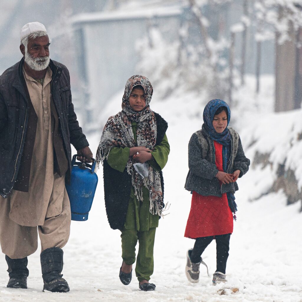 Afghans braving severe cold face stark choice .